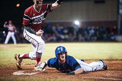 Jake Hyden looks up to the official for the call